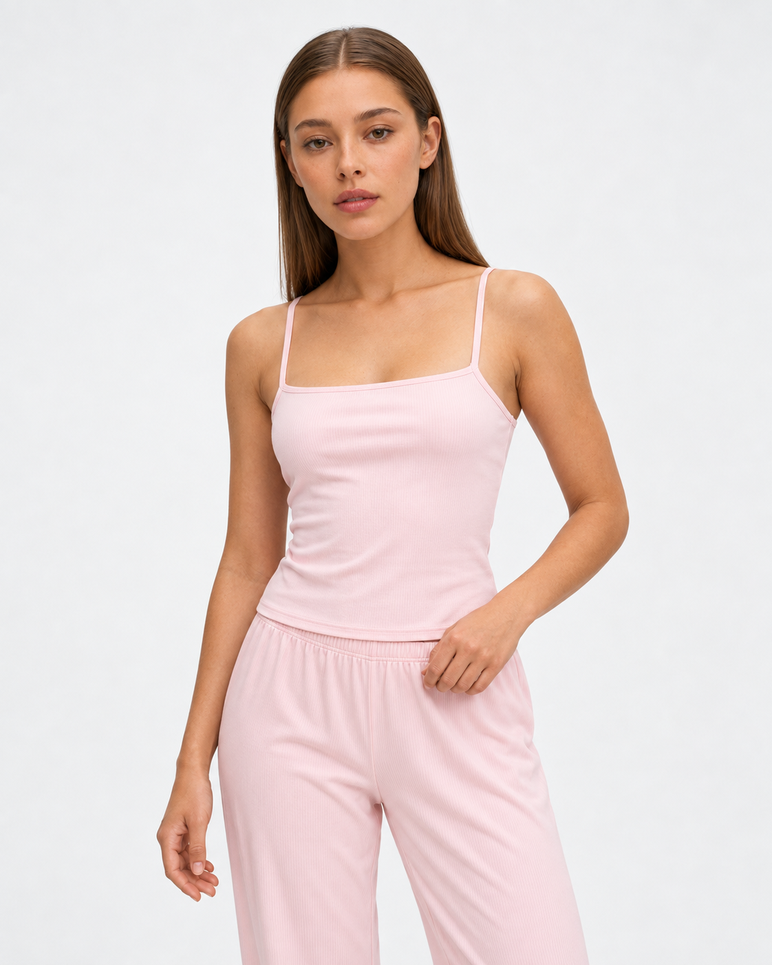 Sara wearing the Cami Sleep Set in pink, closer front view