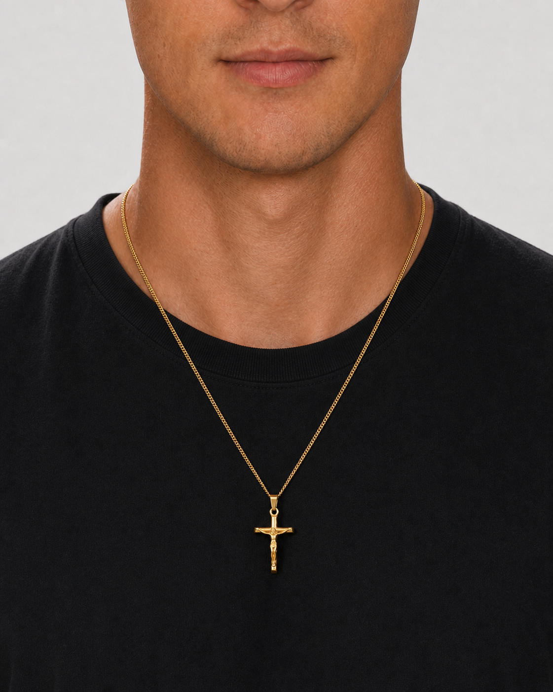 Gold Crucifix Pendant worn on model