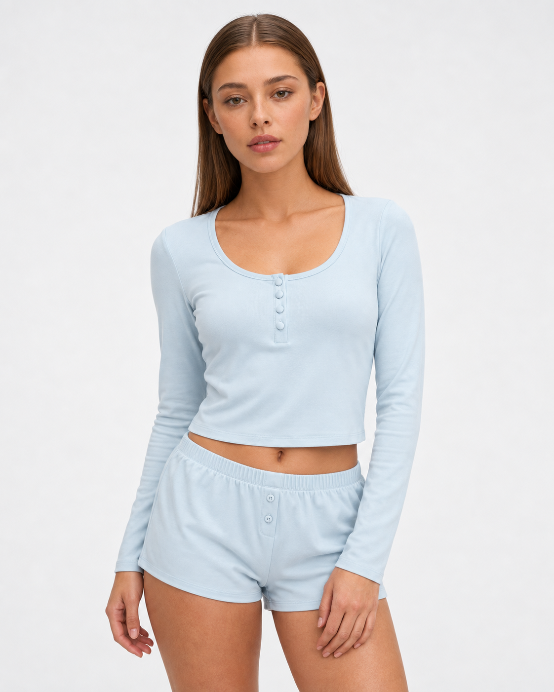 Sara wearing the Henley Sleep Set in light blue, closer front view