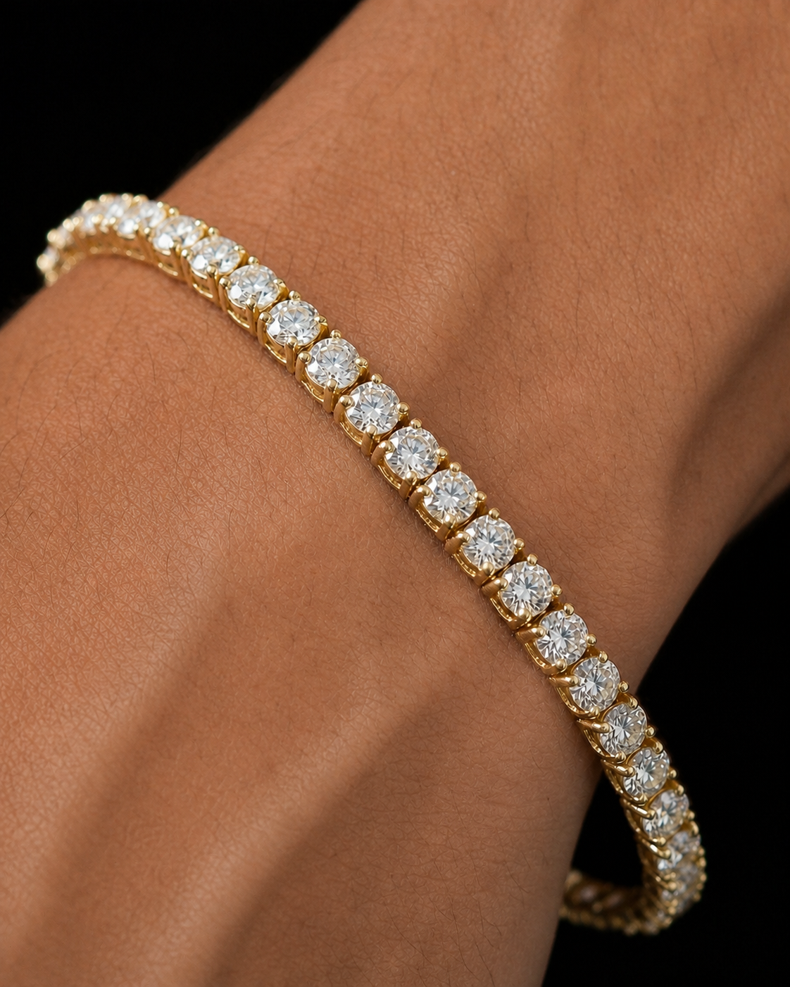 Gold Iced Tennis Bracelet 3 mm worn on Tyler's wrist in a macro close-up
