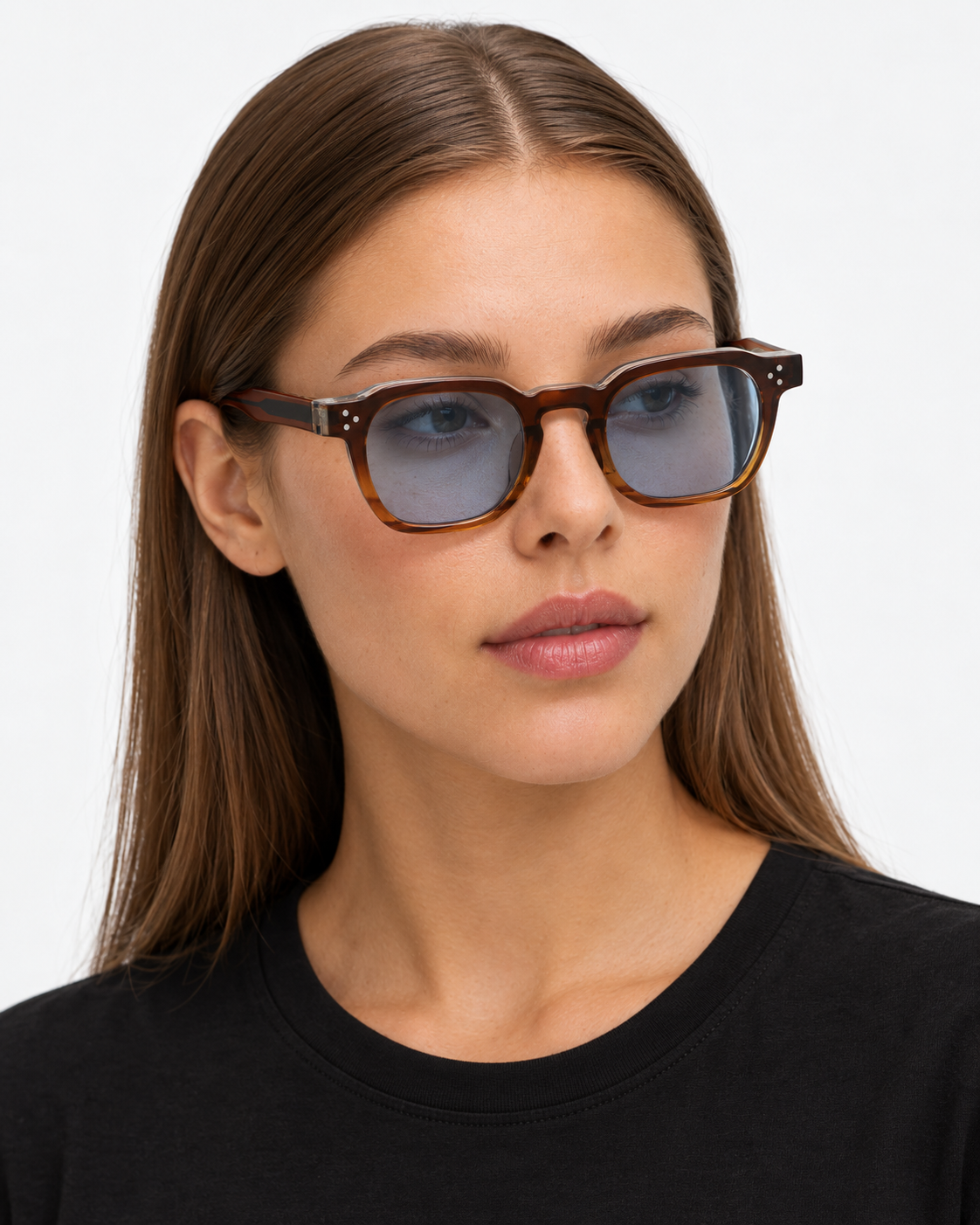 Square Sunglasses in dark tortoiseshell with pale blue lenses, worn by a woman
