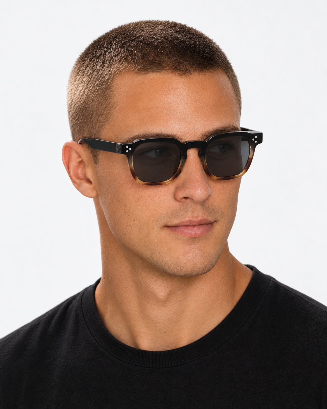 Square Sunglasses in black fading into tortoiseshell with grey lenses, worn by a man