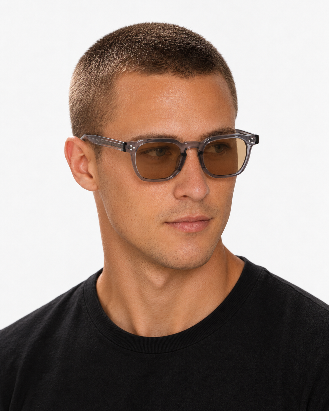 Square Sunglasses in translucent grey with light brown lenses, worn by a man