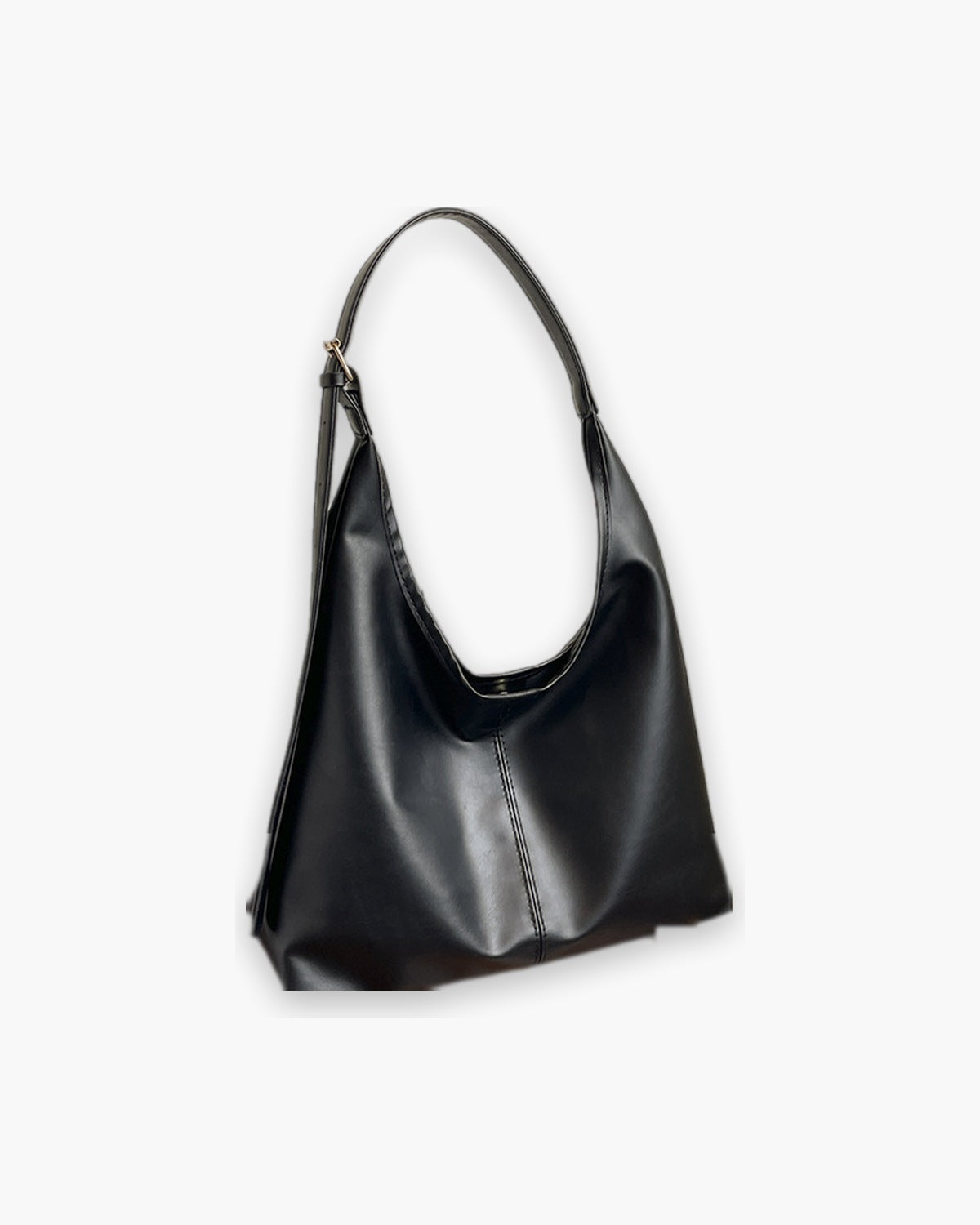 Black slouchy shoulder bag, front view on a plain background