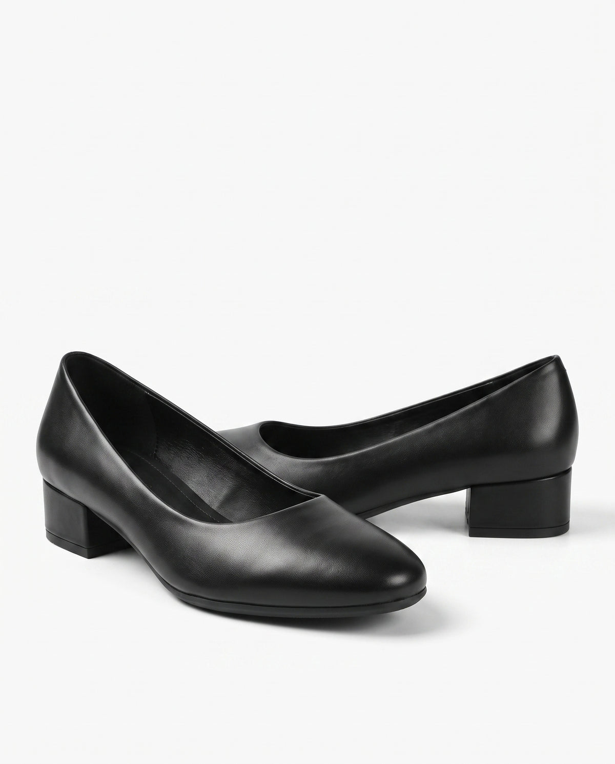 Black leather block heels with a 2.5 cm square heel, round toe and rubber sole, studio product shot