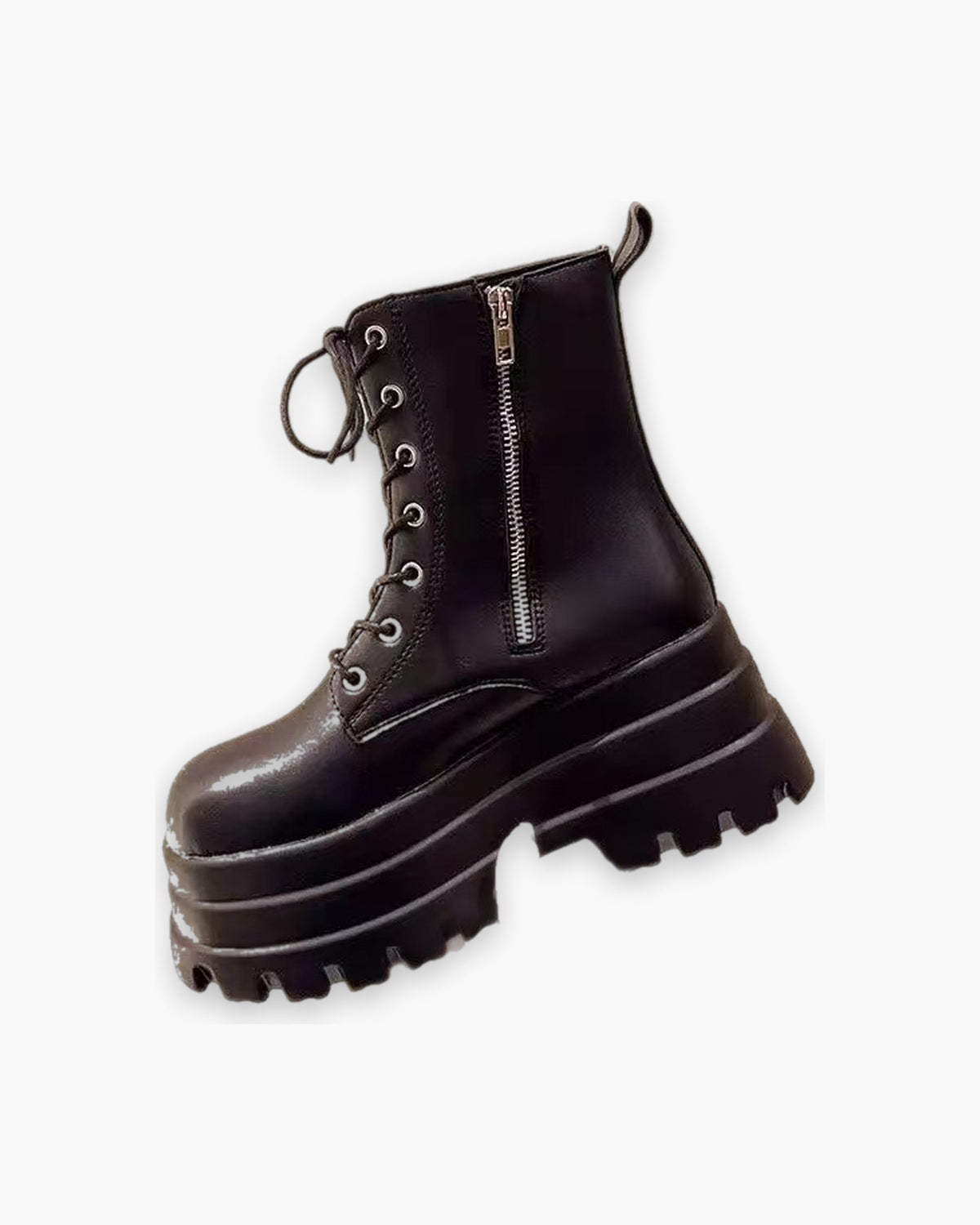 Black platform ankle boot, three quarter view showing the side zip
