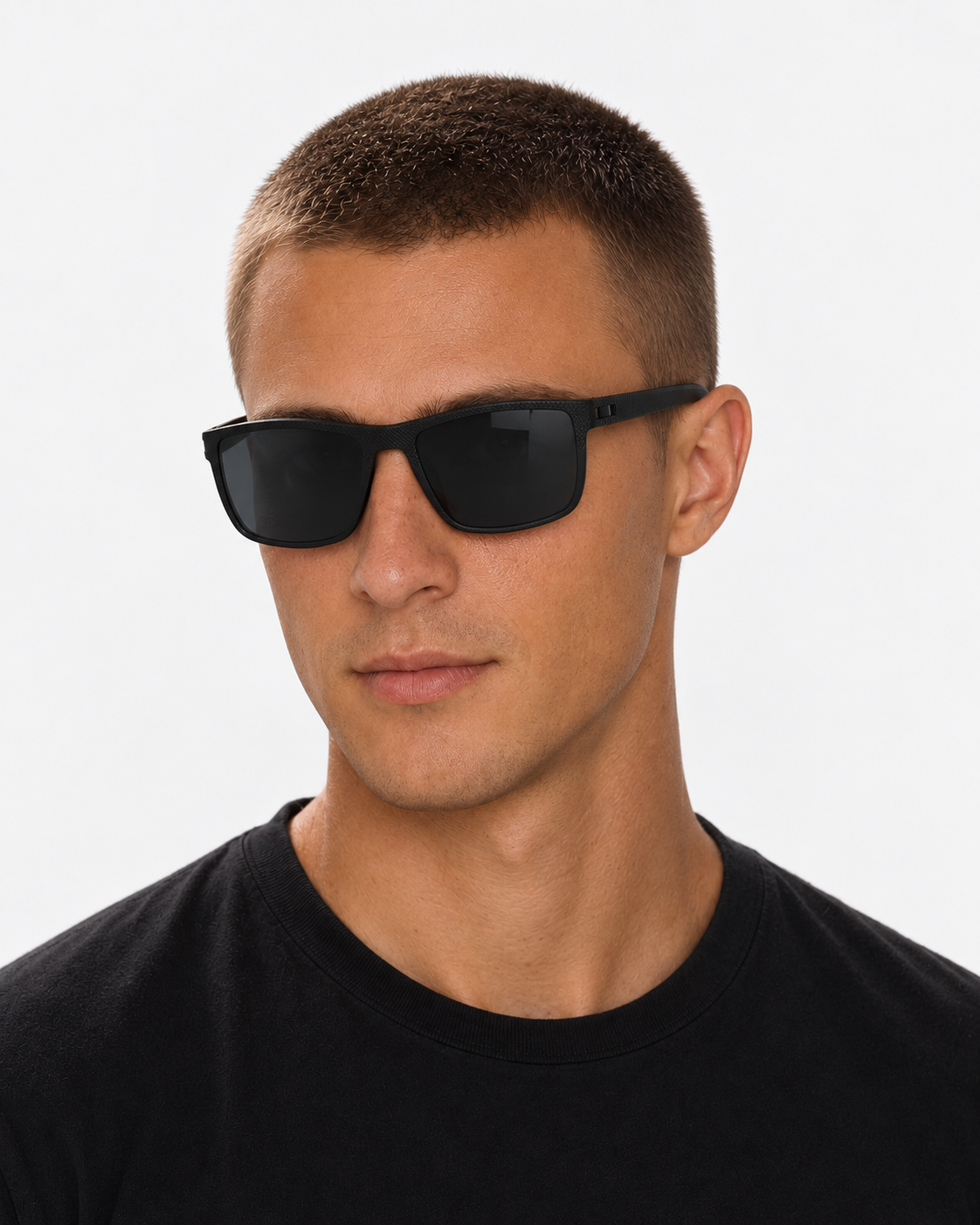 Polarized Sport Sunglasses with a matte black frame and dark grey lenses, worn by a man