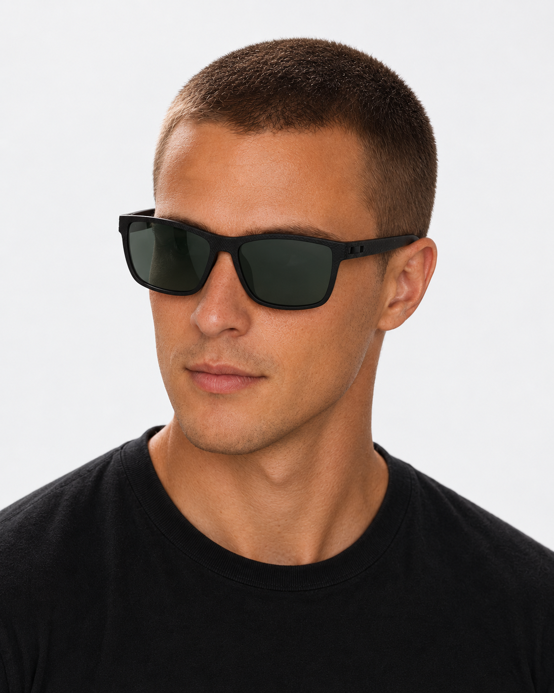 Polarized Sport Sunglasses with a matte black frame and green lenses, worn by a man