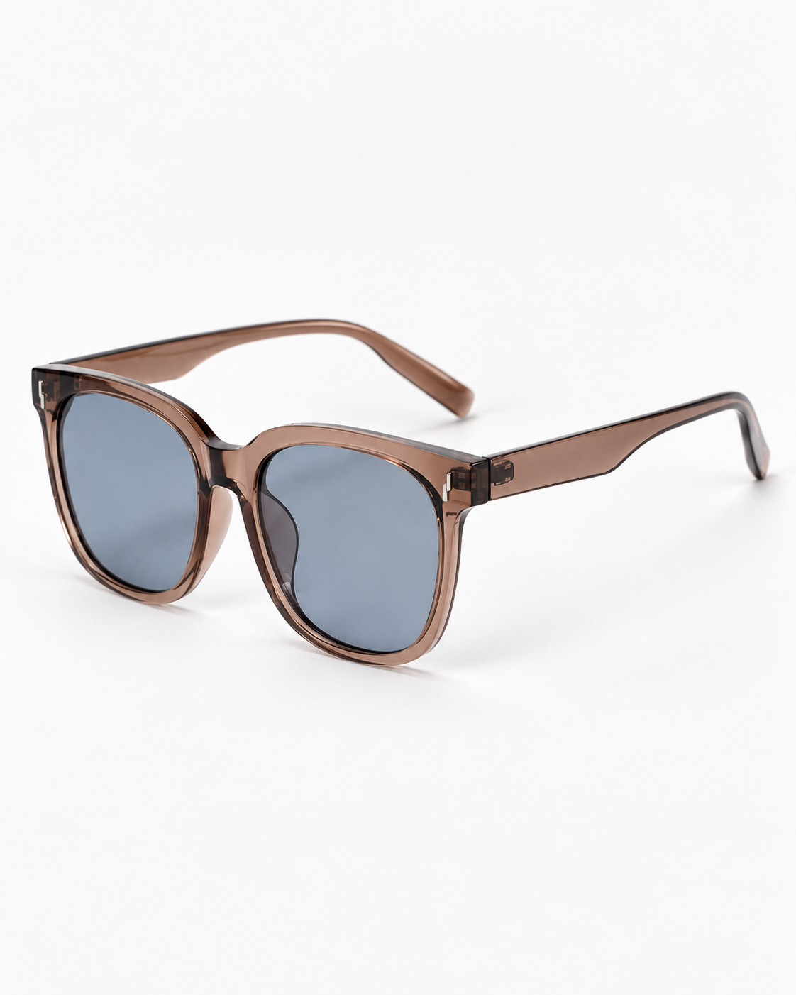 Oversized Square Sunglasses with a translucent brown frame and grey lenses, three-quarter view