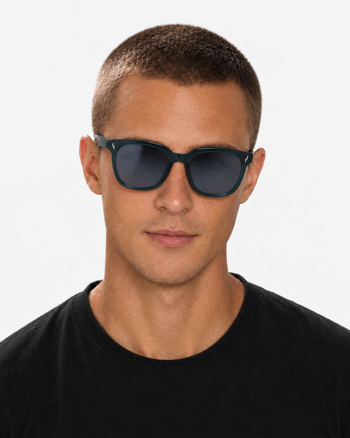 Oversized Square Sunglasses with a translucent teal frame and grey lenses, worn by a man