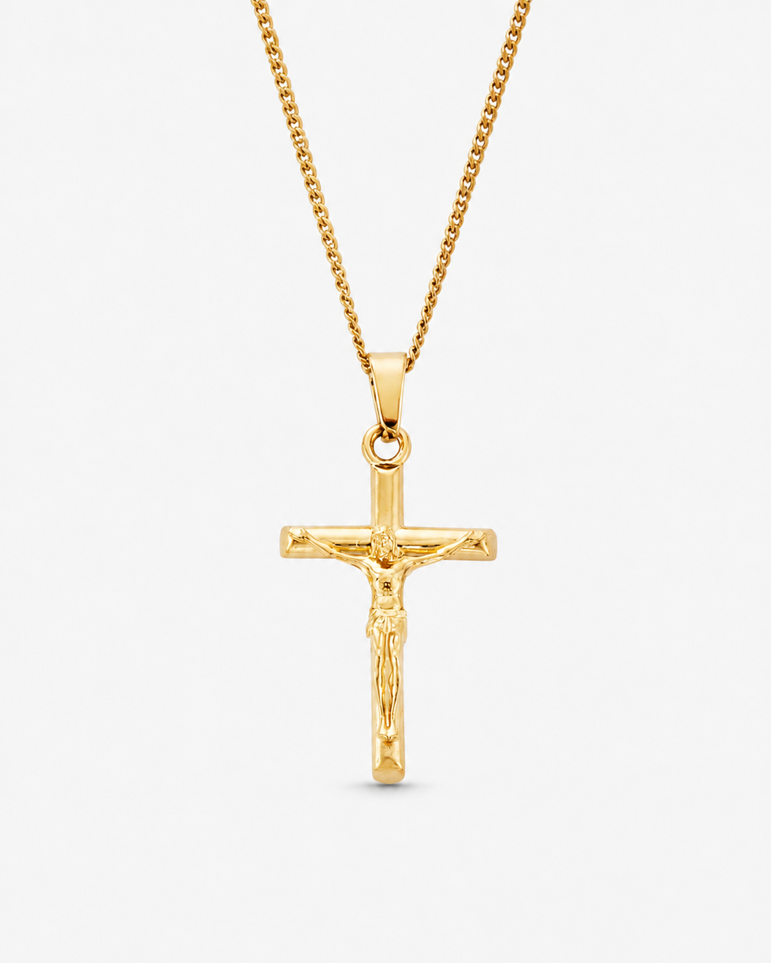 Gold Crucifix Pendant on a near-white background