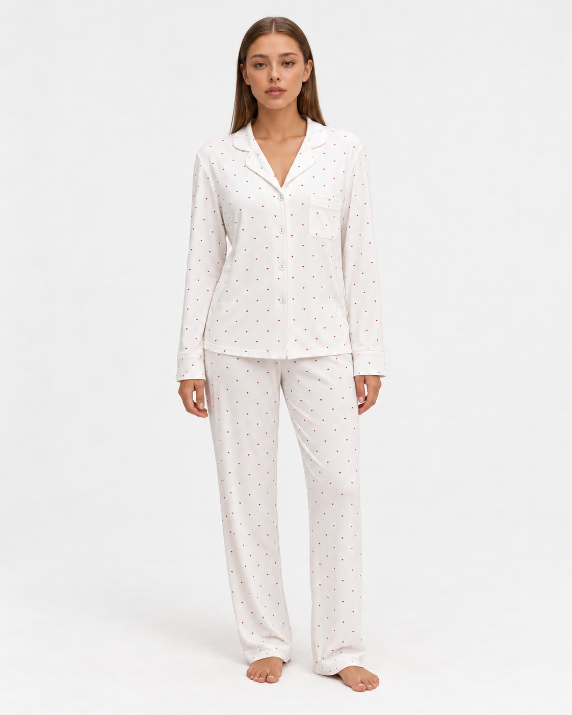 Sara wearing the Heart Print Pajama Set in white hearts, full-length front view