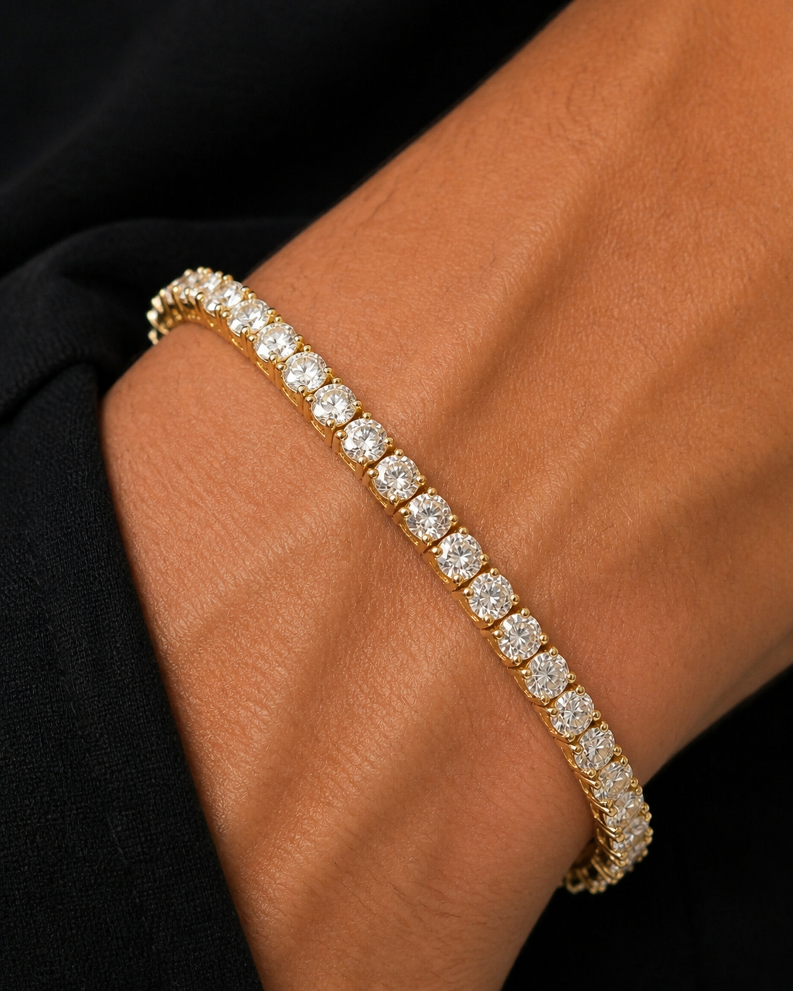 Gold Iced Tennis Bracelet 4 mm worn on Tyler's wrist in a macro close-up