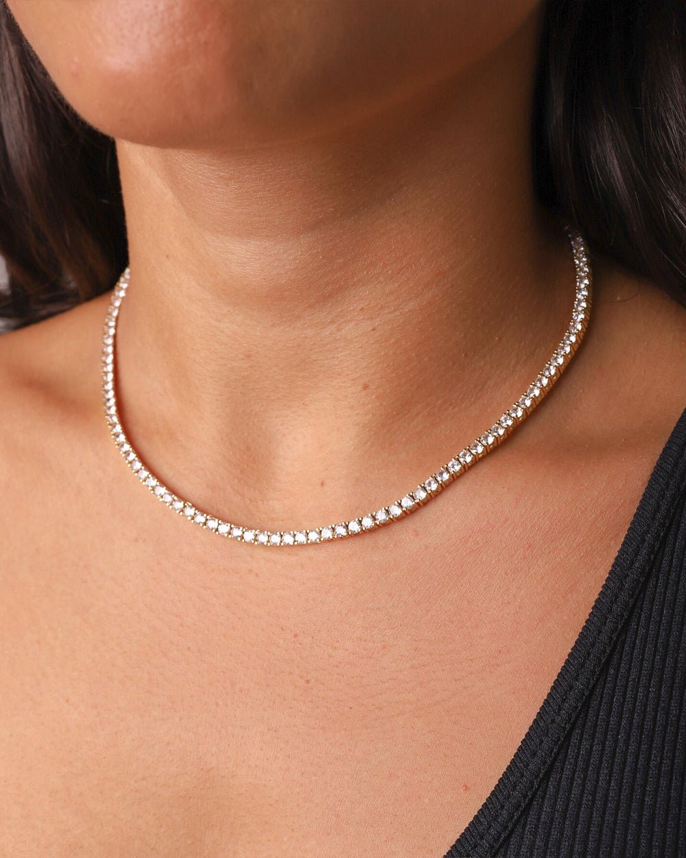 Gold Iced Tennis Chain 3 mm worn by Mell, angled view
