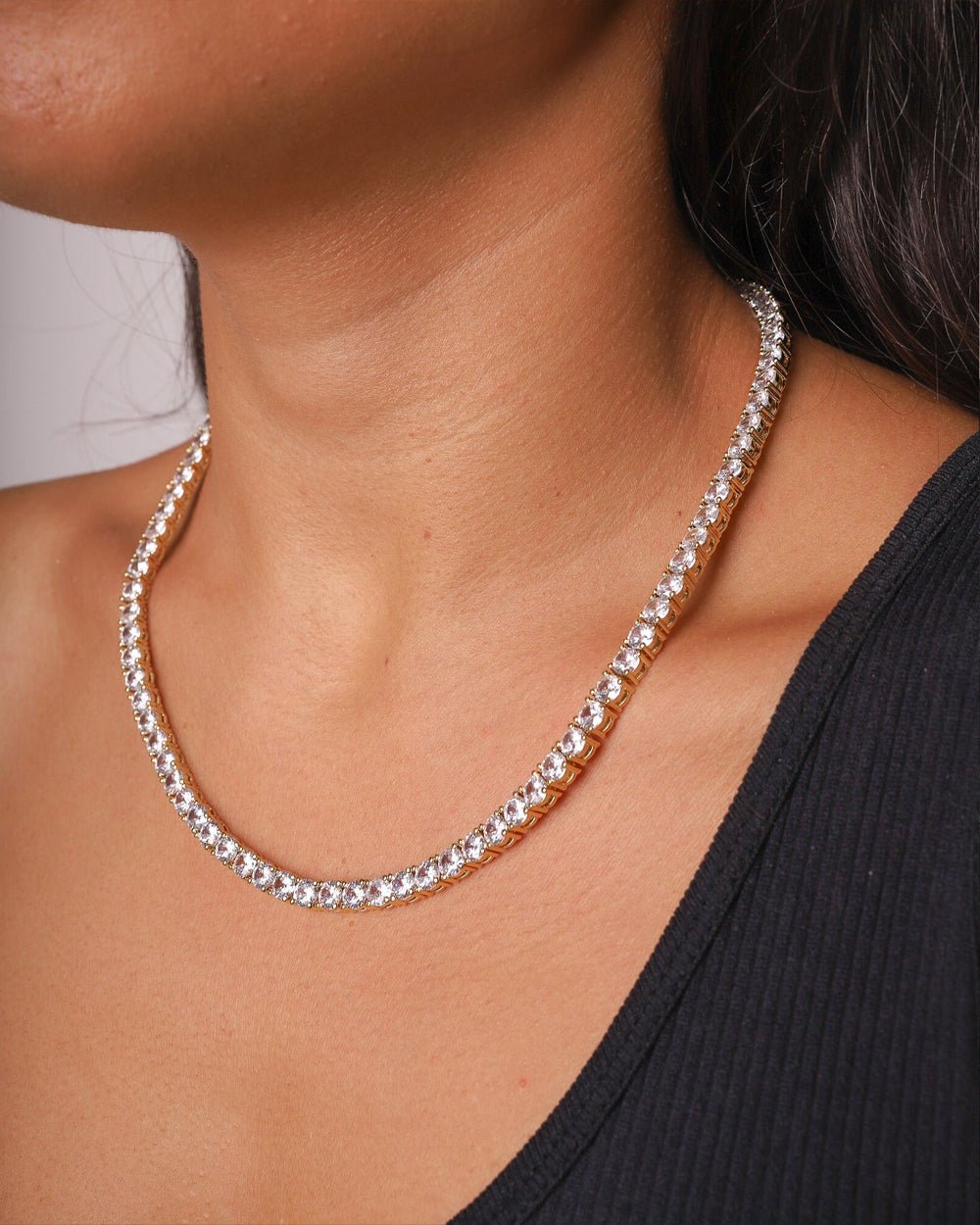 Gold Iced Tennis Chain 5 mm worn by Mell, angled view