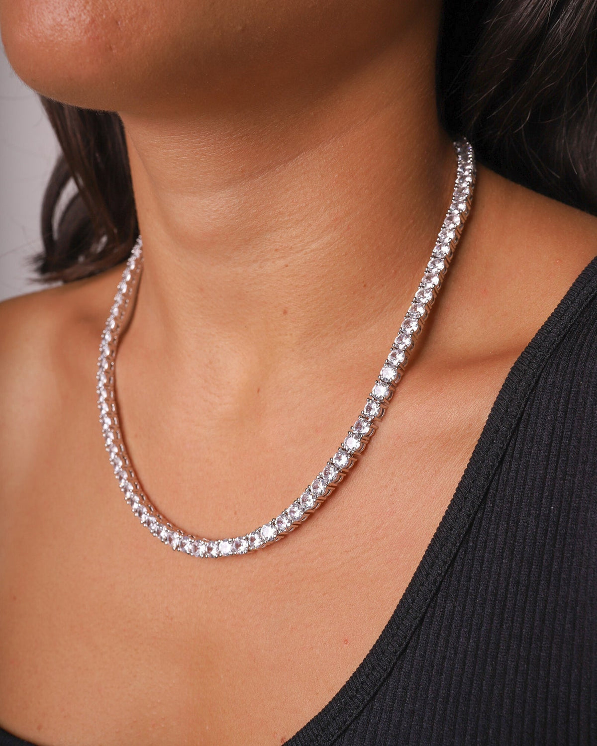 Silver Iced Tennis Chain 5 mm worn by Mell, angled view