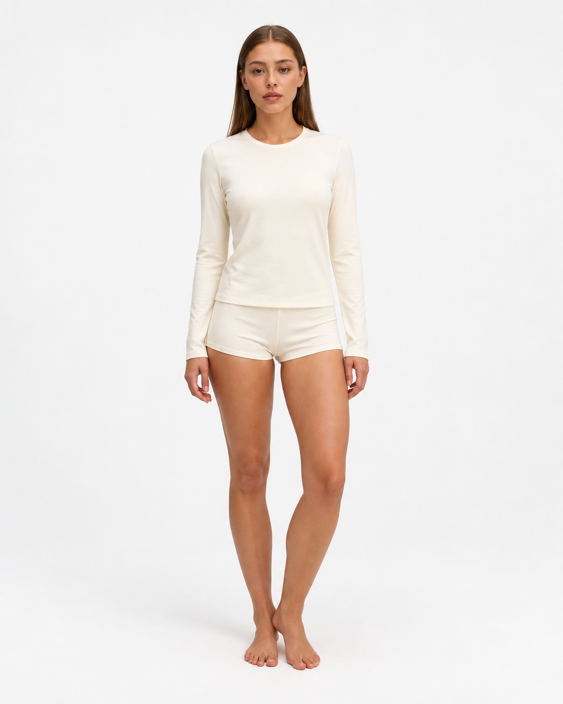 Sara wearing the Jersey Sleep Set in off white, full-length front view