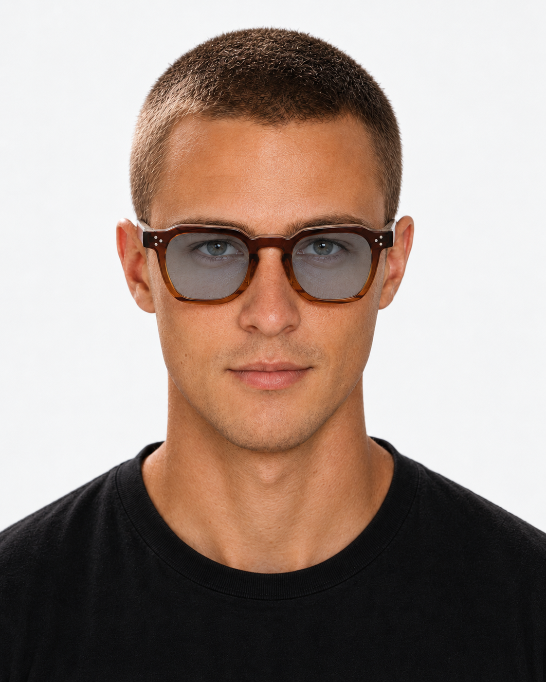 Square Sunglasses in dark tortoiseshell with pale blue lenses, worn by a man