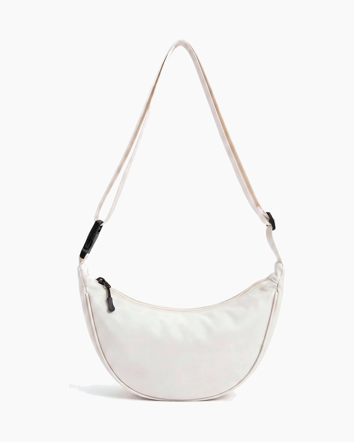 Off-white sling bag with a crescent body and a single top zip, on a plain background