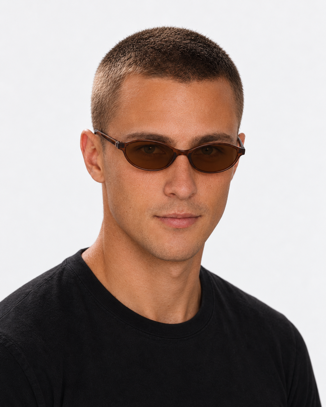 Oval Sunglasses in translucent brown with brown lenses, worn by a man