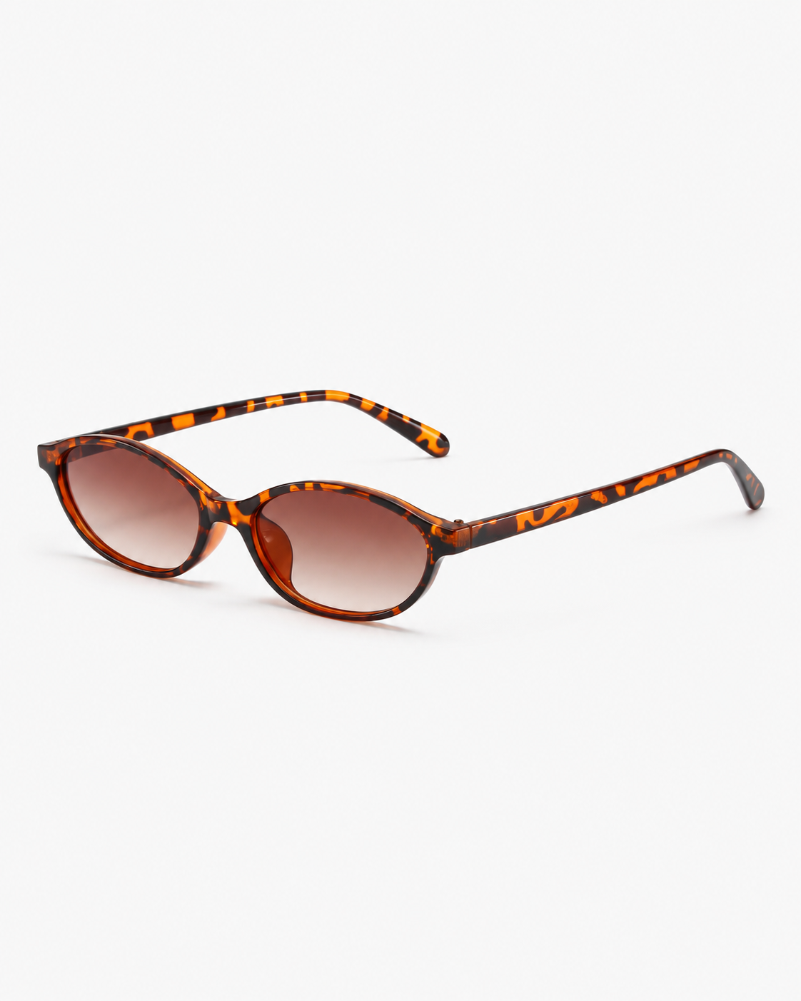 Oval Sunglasses in tortoiseshell with brown gradient lenses, side view