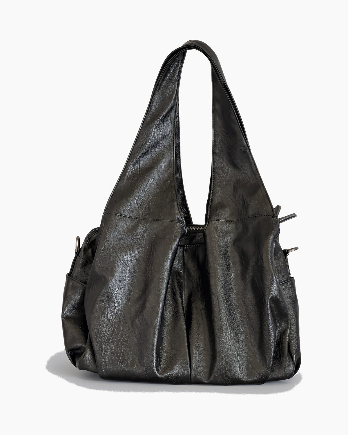 Black soft shopper bag with twin straps and a gathered body, on a plain background