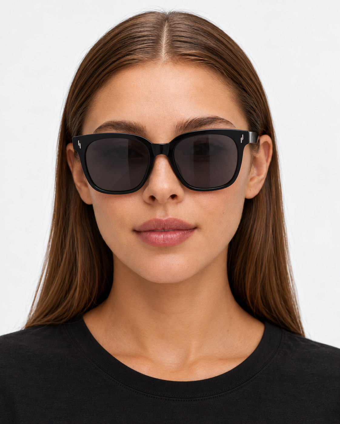 Oversized Square Sunglasses with a gloss black frame and grey lenses, worn by a woman