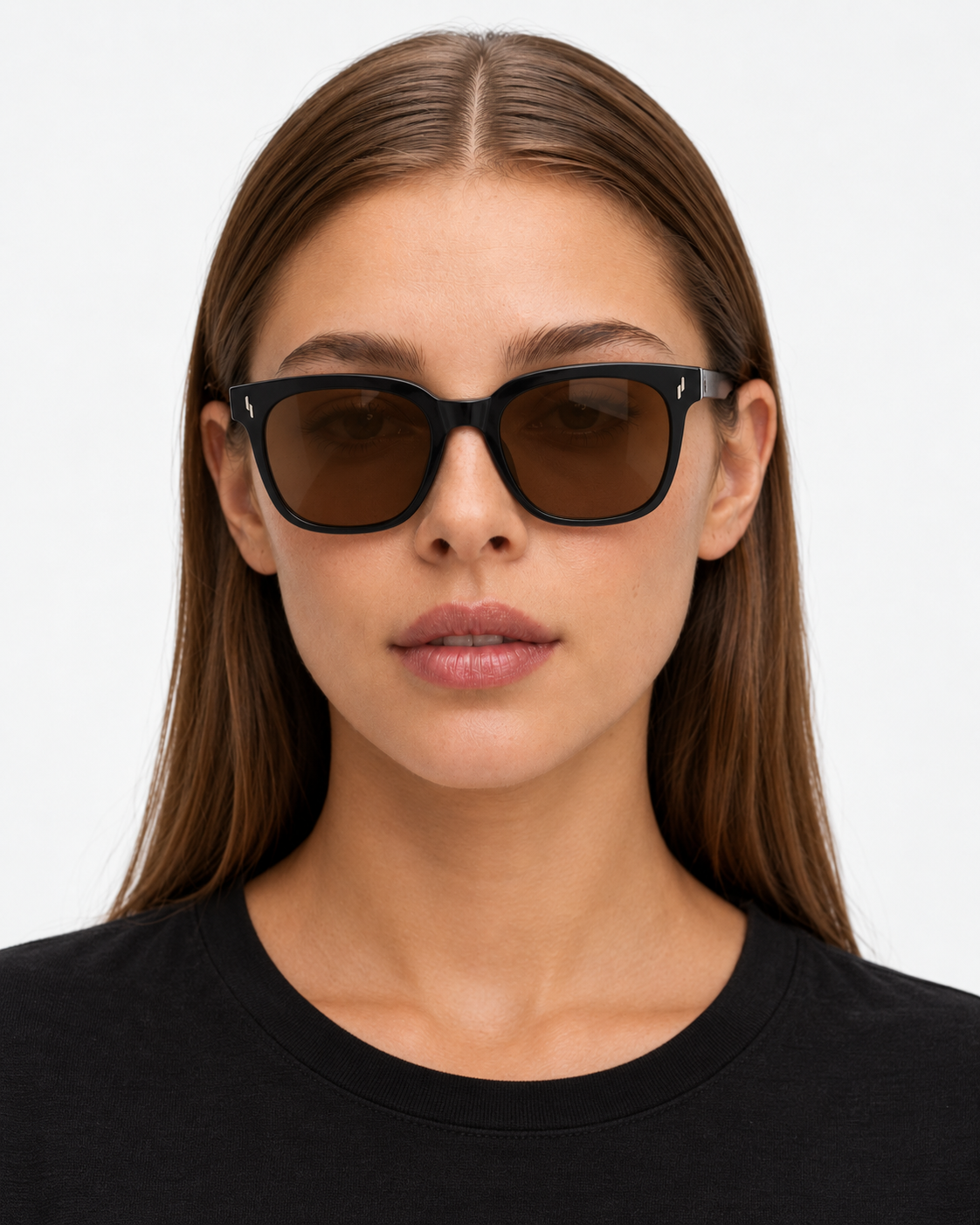 Oversized Square Sunglasses with a gloss black frame and brown lenses, worn by a woman