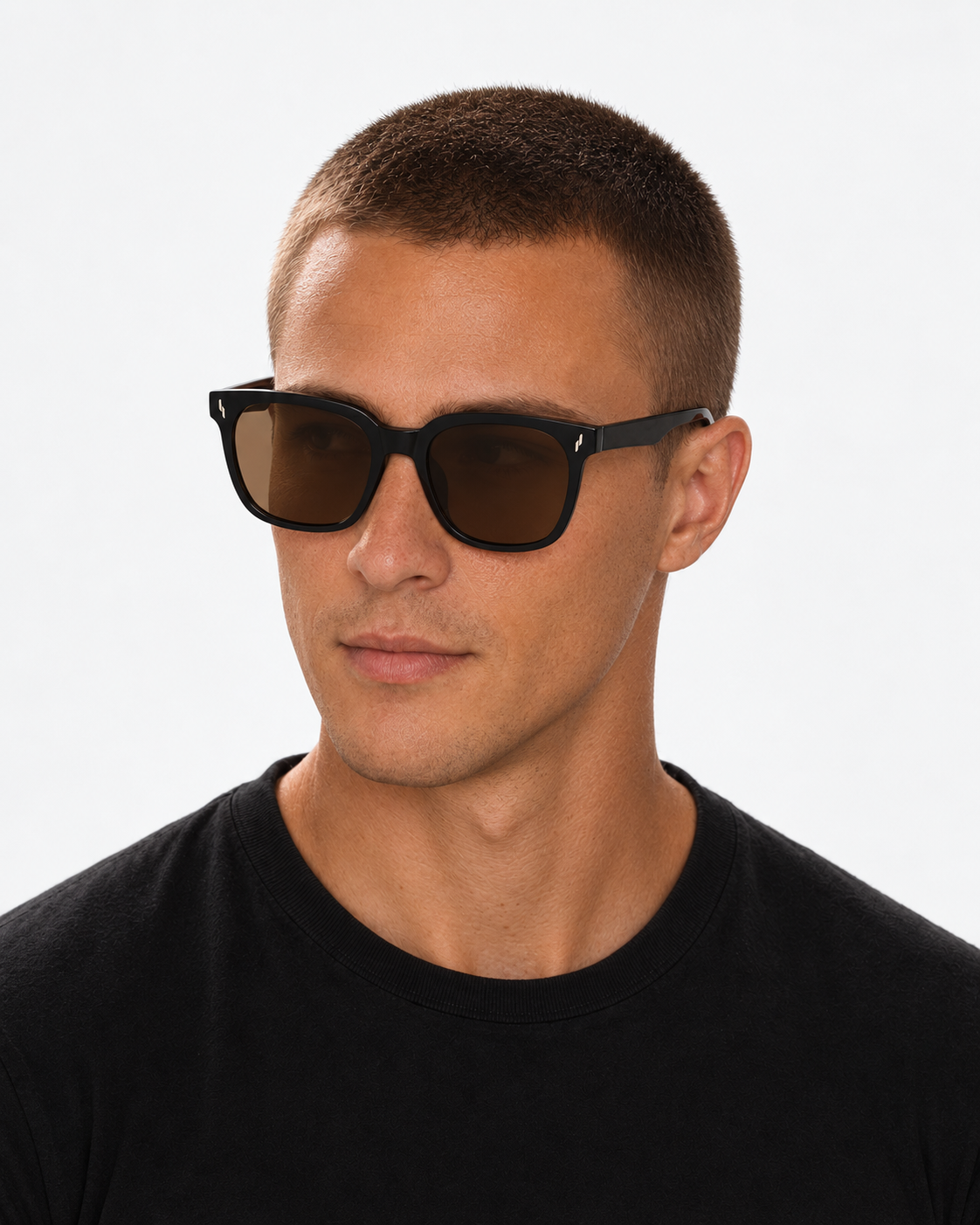 Oversized Square Sunglasses with a gloss black frame and brown lenses, worn by a man