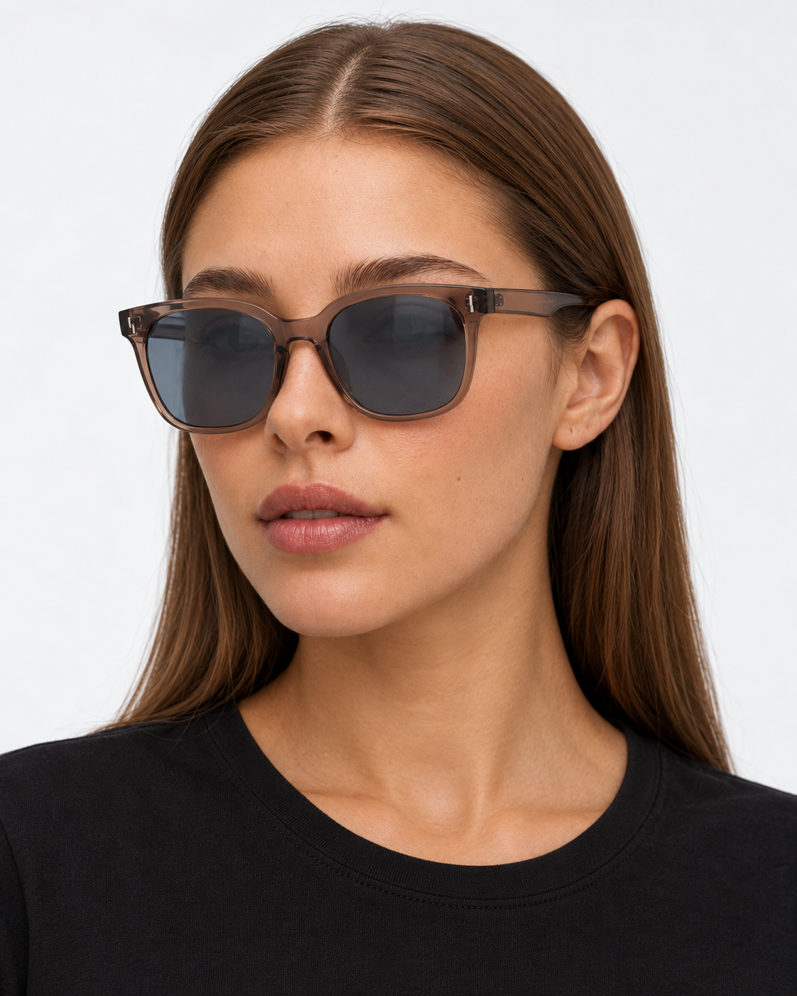Oversized Square Sunglasses with a translucent brown frame and grey lenses, worn by a woman