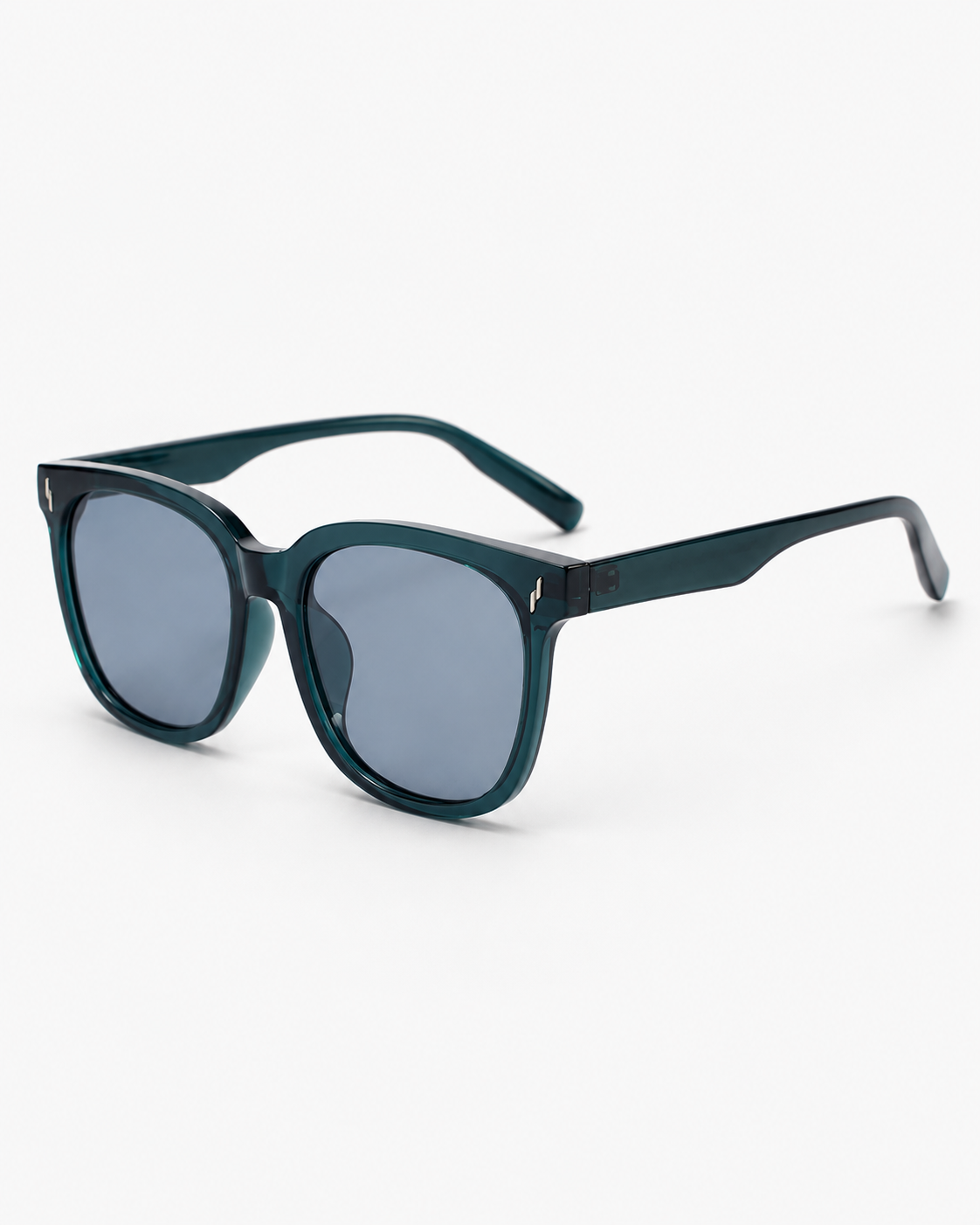 Oversized Square Sunglasses with a translucent teal frame and grey lenses, three-quarter view