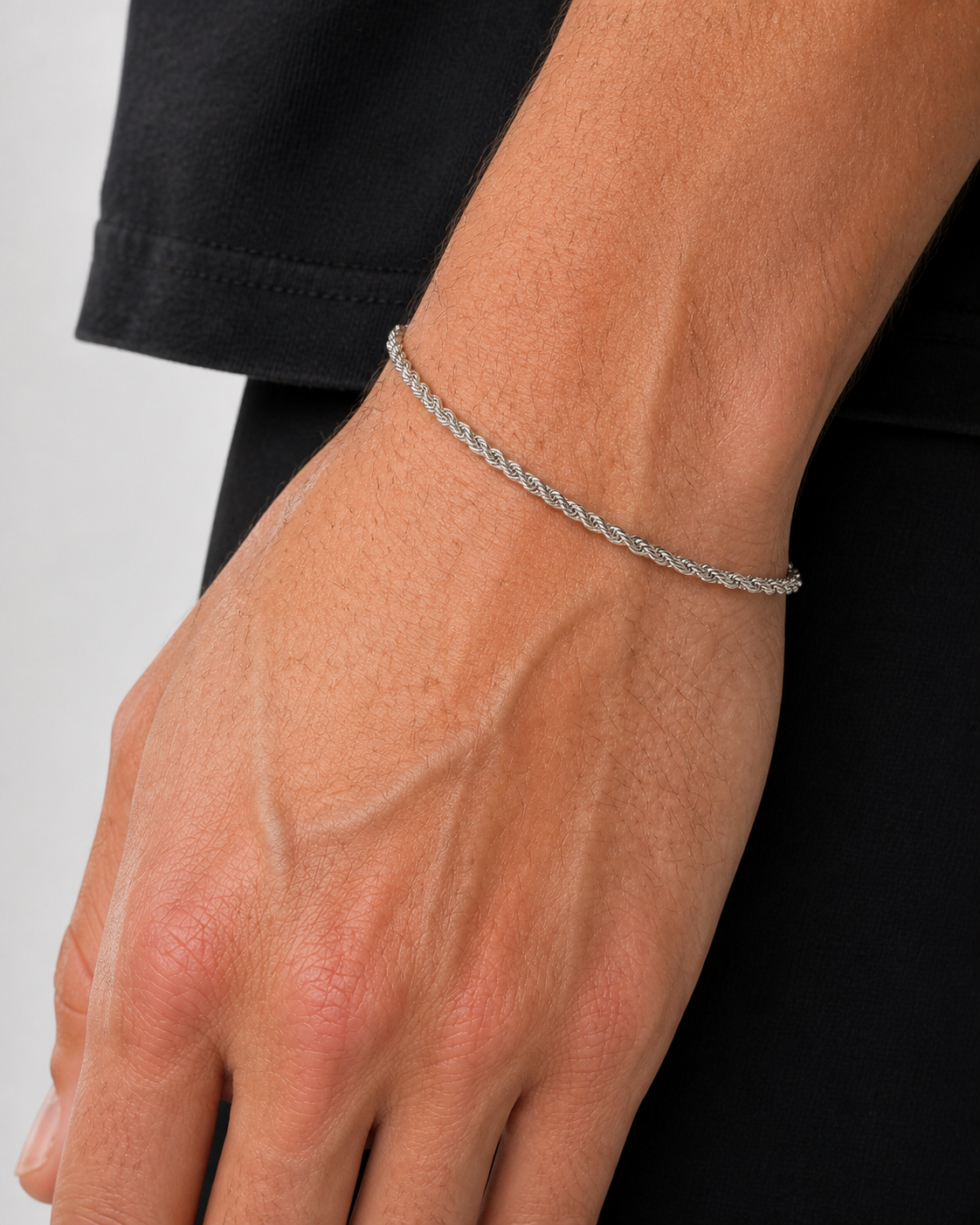 Silver Rope Bracelet 2 mm worn on Tyler's wrist